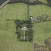 Oblique aerial view centred on the house, walled garden and gate piers, taken from the NNE.