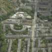 Oblique aerial view centred on the academy with the road bridge adjacent, taken from the WNW.