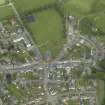 Oblique aerial view of the town centred on the churches, taken from the SW.