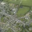 Oblique aerial view of the town centred on the churches, taken from the SSE.