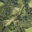 Oblique aerial view centred on the walled garden and the garden house, taken from the NW.