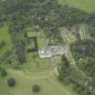 Oblique aerial view centred on the country house, walled garden, gardens and terraces, taken from the ESE.