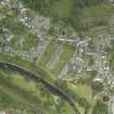 Oblique aerial view of the town centred on the cathedral, chapel, burial-ground and hall, taken from the SW.