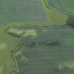 Oblique aerial view centred on the cropmarks of the rig, quarry and possible enclosure, taken from the NNW.