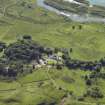 Oblique aerial view centred on the country house, taken from the WNW.