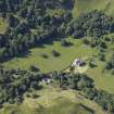 Oblique aerial view centred on the country house with the walled garden adjacent, taken from the NNE.