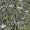 General oblique aerial view centred on the friary, colleges, hospital, churches, tolbooth and cathedral, taken from the ENE.