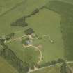 Oblique aerial view centred on the country house, dovecot and garden, taken from the S.