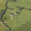 Oblique aerial view centred on the country house, dovecot and garden, taken from the SE.