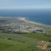 General oblique aerial view centred on the gas terminal, taken from the SW.