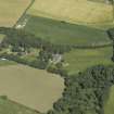 Oblique aerial view centred on the country house, house and walled garden, taken from the WSW.