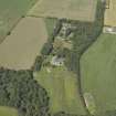 Oblique aerial view centred on the country house, house and walled garden, taken from the S.