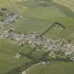 General oblique aerial view centred on the village, taken from the WSW.