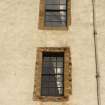 Detail of 1st and 2nd floor windows at E end of S facade