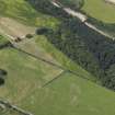 General oblique aerial view centred on the cropmarks of the unenclosed settlement, pits and possible souterrain, taken from the ESE.