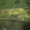 Oblique aerial view centred on the cropmarks of the settlement, taken from the S.