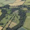 General oblique aerial view centred on the country house, gardens, stables, farmsteading and gate-lodge, taken from the SE.