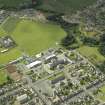 Oblique aerial view centred on the school, taken from the N.