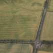 Oblique aerial view centred on the cropmarks of the pit-alignments, taken from the NE.