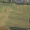 Oblique aerial view centred on the cropmarks of the Roman temporary camp, taken from the SSW.