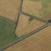 Oblique aerial view centred on the cropmarks of the enclosures, taken from the SW.