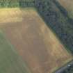 Oblique aerial view centred on the cropmarks of the settlement, taken from the WNW.
