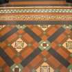 Interior. Office block. Ground floor.  Detail of original encaustic-tile floor in the Gothic revival style.