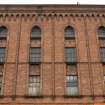 S Building. E side. Detail of Tradeston Street frontage of no. 108-118 showing lancets, machiolations and fenestration details.