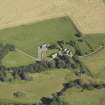 Oblique aerial view centred on the church, manse and burial-ground, taken from the WSW.