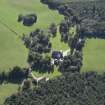 Oblique aerial view centred on the country house, hotel and hall-house, taken from the NE.