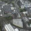 Oblique aerial view of Tradeston centred on the warehouses and Eglinton Engine works, taken from the ESE.