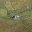 Oblique aerial view centred on the farmsteading and farmhouse, taken from the SW.