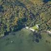 Oblique aerial view centred on the house, taken from the ENE.