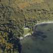 Oblique aerial view centred on the house, taken from the SE.