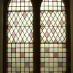 Interior. Typical stained glass window. Detail