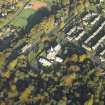 Oblique aerial view centred on the church, taken from the S.