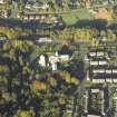 Oblique aerial view centred on the church, taken from the SE.
