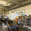 Interior.  Boat repair hangar showing workshop area.