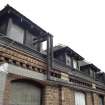 Roof area. Dormers and coloured glass windows. Detail