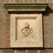 Detail.  carved stone plaque 'G R VI with crown' on central block of main Sandhurst Barrack.