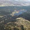 General oblique aerial view of Loch Laggan centred on the dam with the farmstead in the distance, taken from the S.