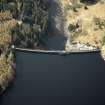 Oblique aerial view centred on the dam, taken from the ENE.