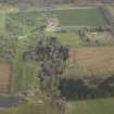 General oblique aerial view centred on the country house, garden, garden house and farmsteading, taken from the E.