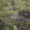 Oblique aerial view centred on the country house, taken from the NW.