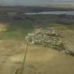General oblique aerial view centred on the village, taken from the SSE.