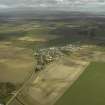 General oblique aerial view centred on the village, taken from the E.