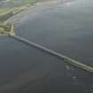 Oblique aerial view centred on the road bridge, taken from the WSW.