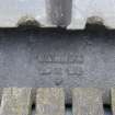 Detail.  Cast iron fall plate stamped 'Carron 1824' at bottom of roof skylight.