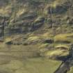 Oblique aerial view centred on the remains of the township and potato damps, taken from the NNW.