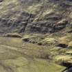 Oblique aerial view centred on the remains of the township, taken from the NW.